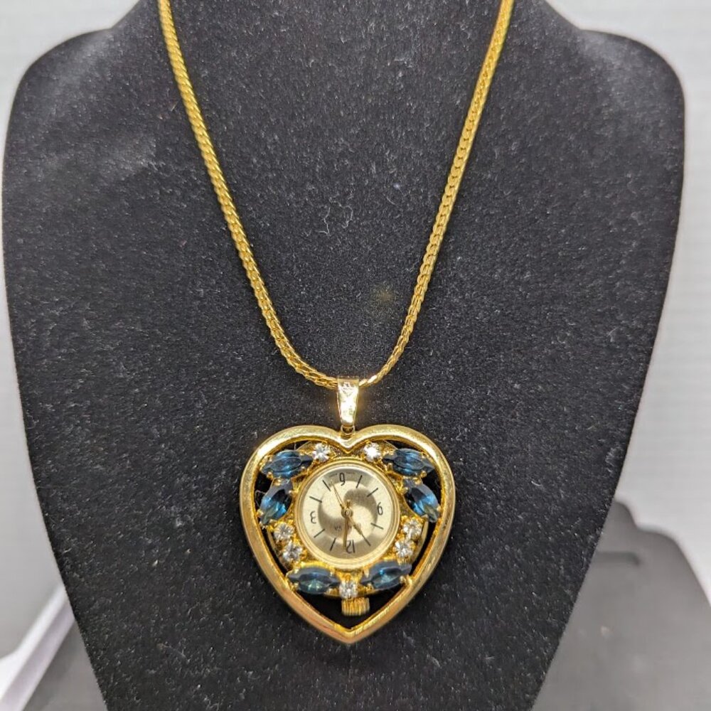 Ladies Geneva heart shaped pendant watch